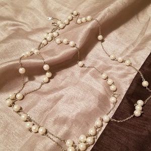 Strand of faux Pearl's on silver chain